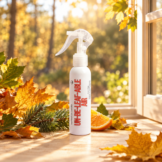 Un-be-leaf-able Air room spray in a bright woodland fall setting