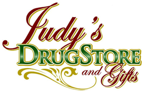 Logo of Judy's Drug Store and Gifts with decorative text on a white background