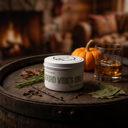 Gourd Vibes Only 6 oz candle standing upright in a rustic fall setting