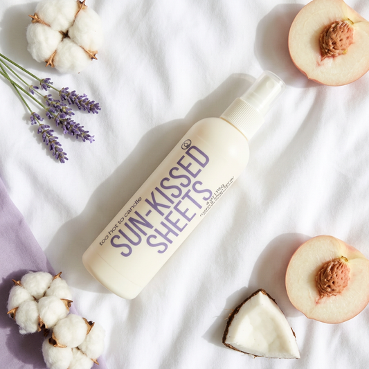 Sun-kissed Sheets Spray flat lay with cotton, white peach, lavender, and coconut